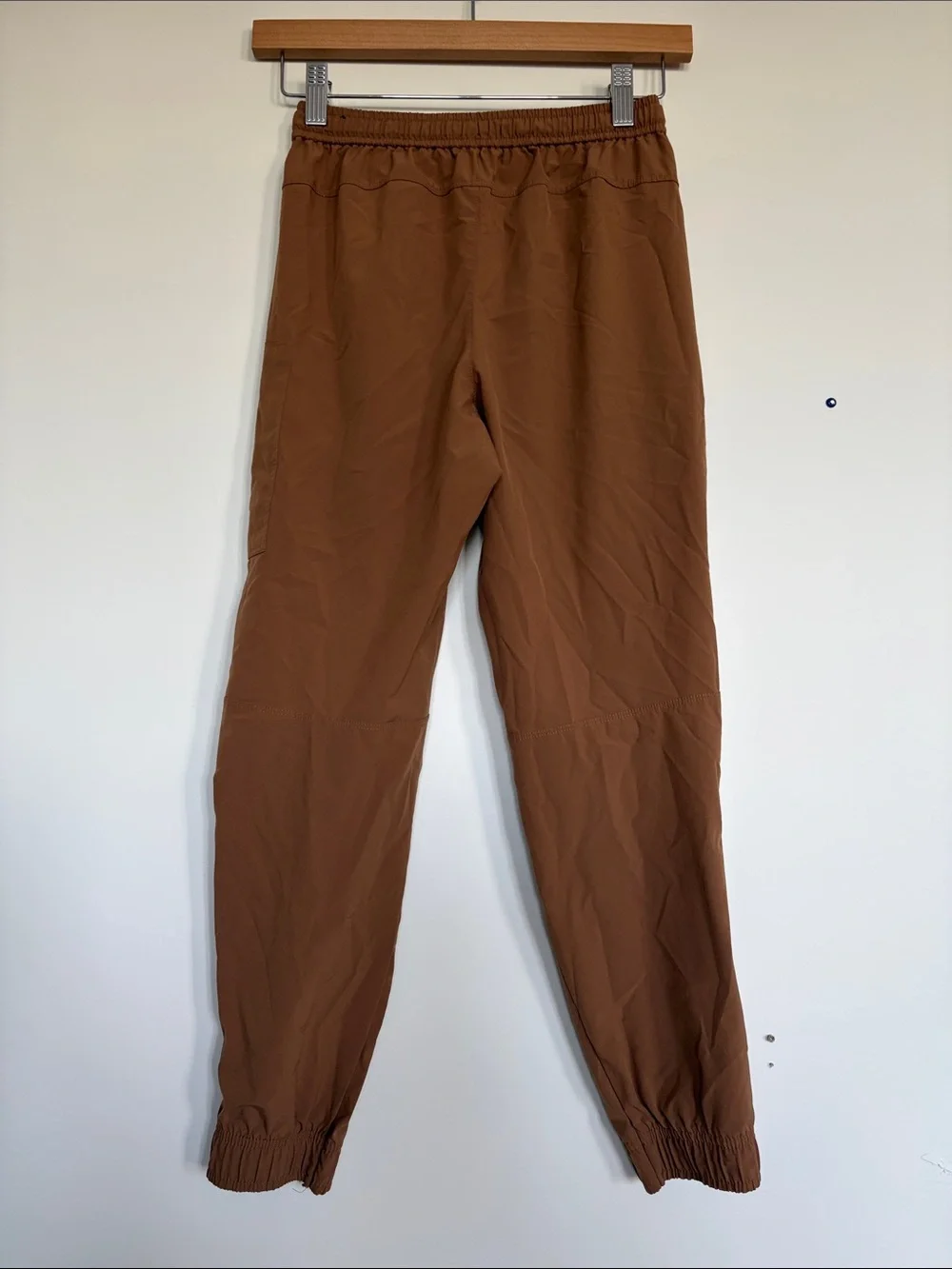 Nike Beige Pants with Light Blue Jeans and Brown Joggers